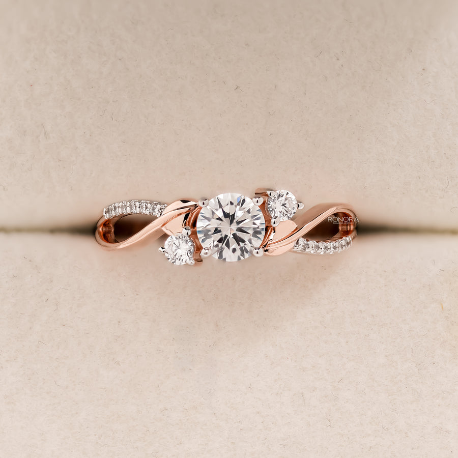 Eloise round lab grown diamond bypass ring in rose gold inside Ronora box