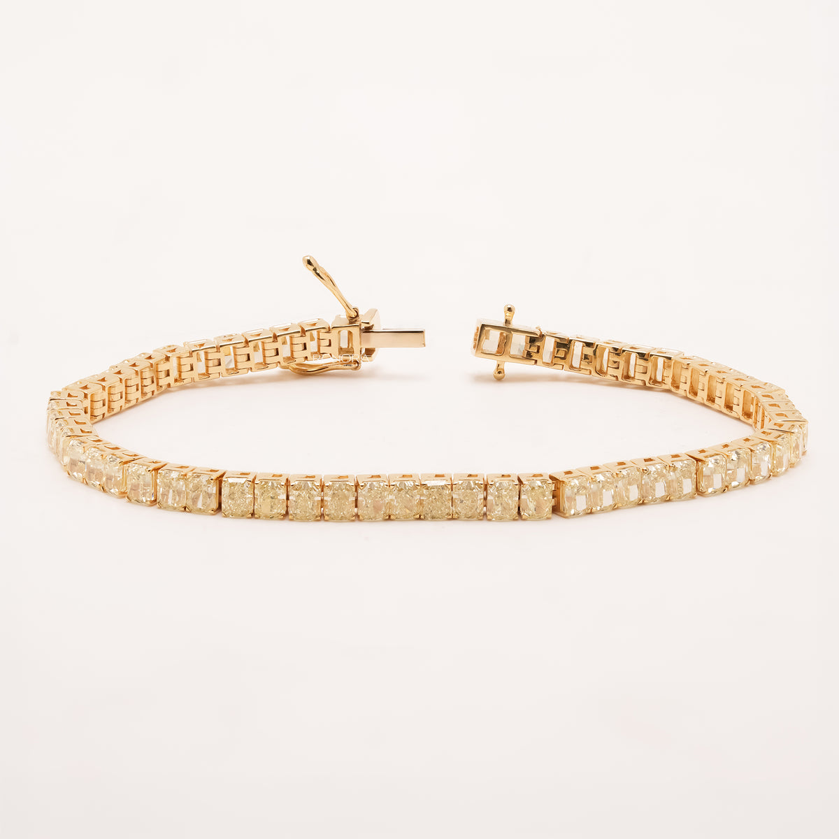 Open radiant yellow lab grown diamond tennis bracelet with clasp