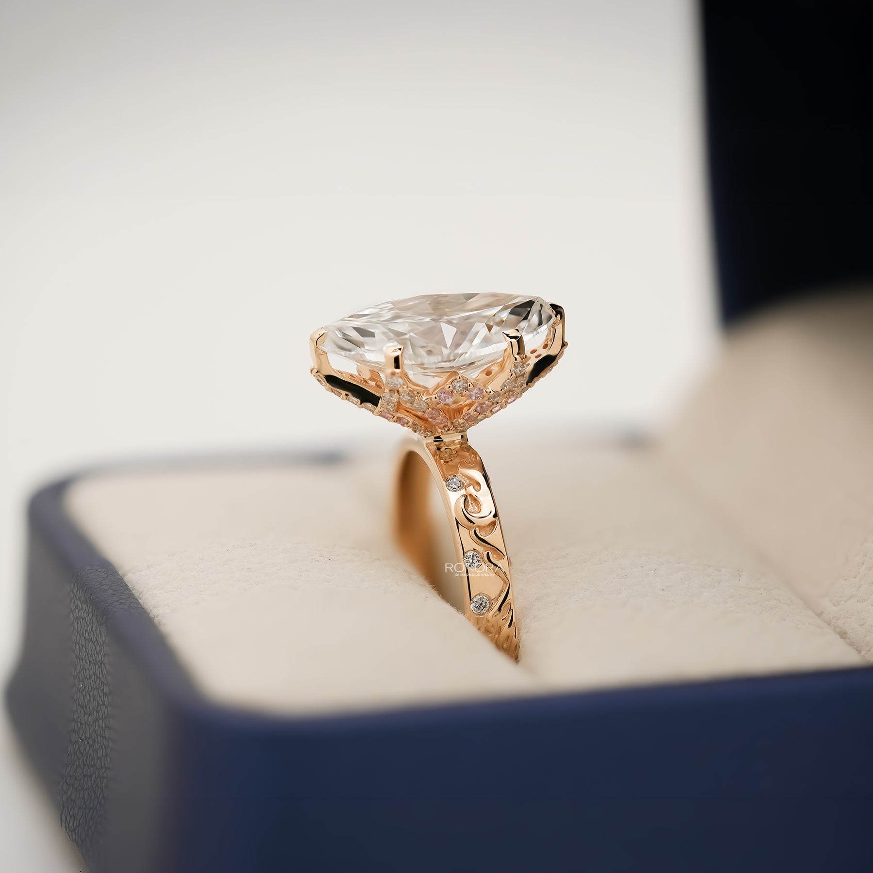 marquise lab grown diamond vintage halo ring worn with luxury styling in yellow gold