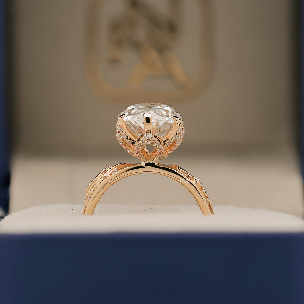 Angled view of marquise lab grown diamond vintage halo ring with vintage halo setting