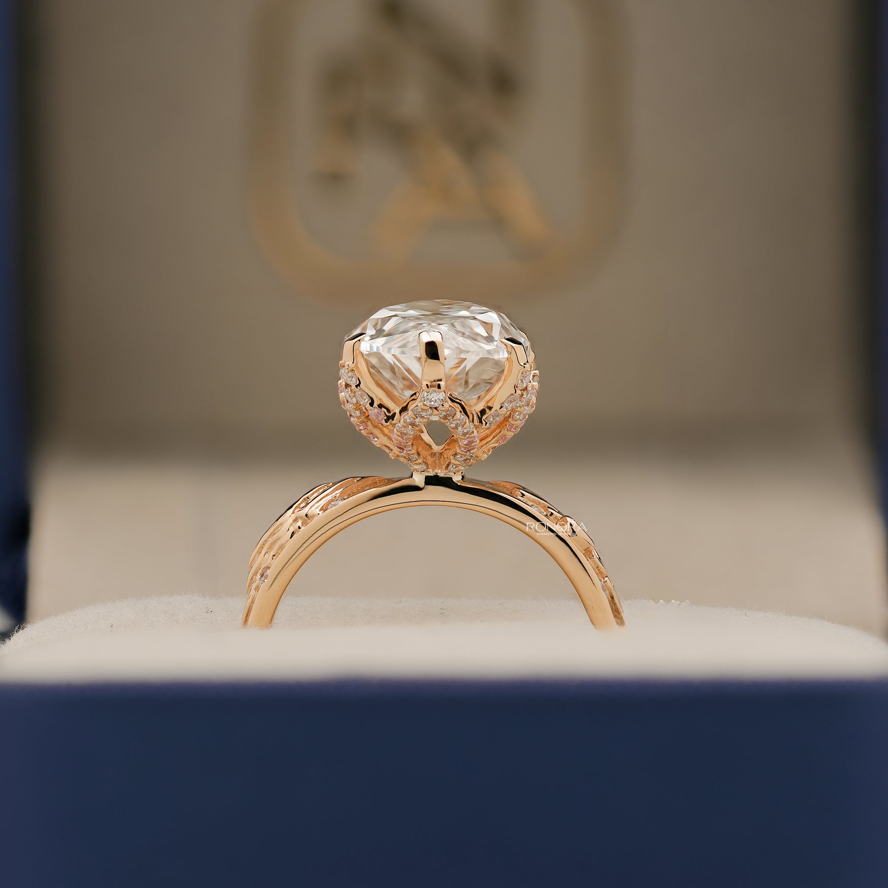 Angled view of marquise lab grown diamond vintage halo ring with vintage halo setting