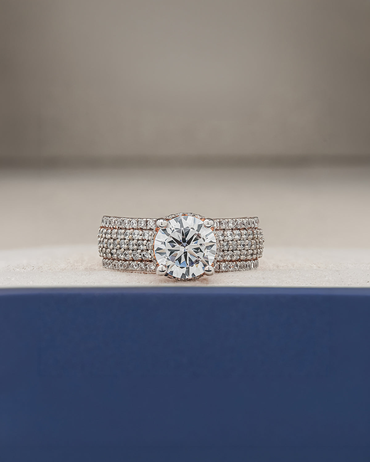 Adeline round moissanite pave ring in rose gold inside Ronora box