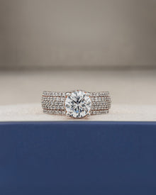 Adeline round moissanite pave ring in rose gold inside Ronora box