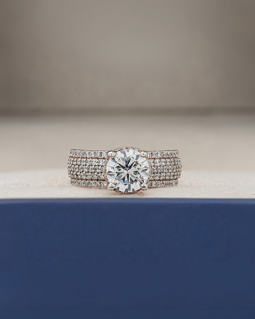 Adeline round moissanite pave ring in rose gold inside Ronora box