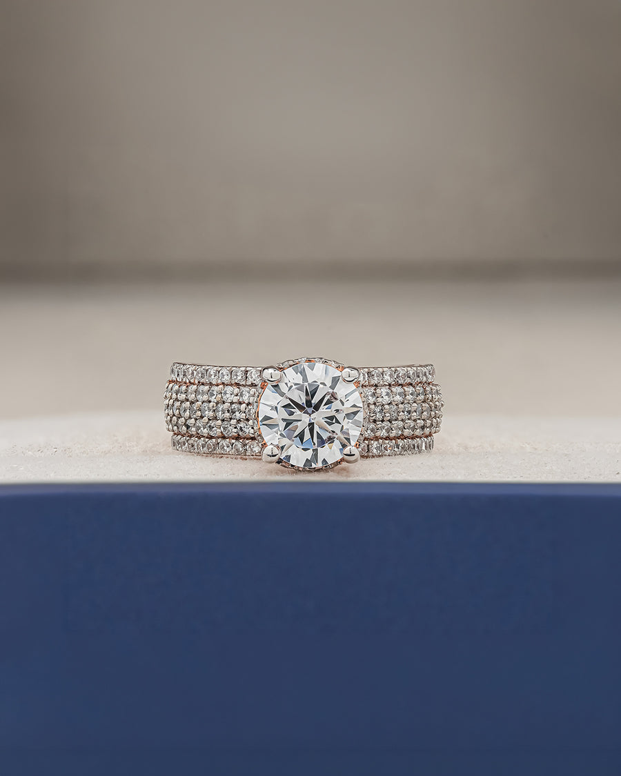 Adeline round moissanite pave ring in rose gold inside Ronora box