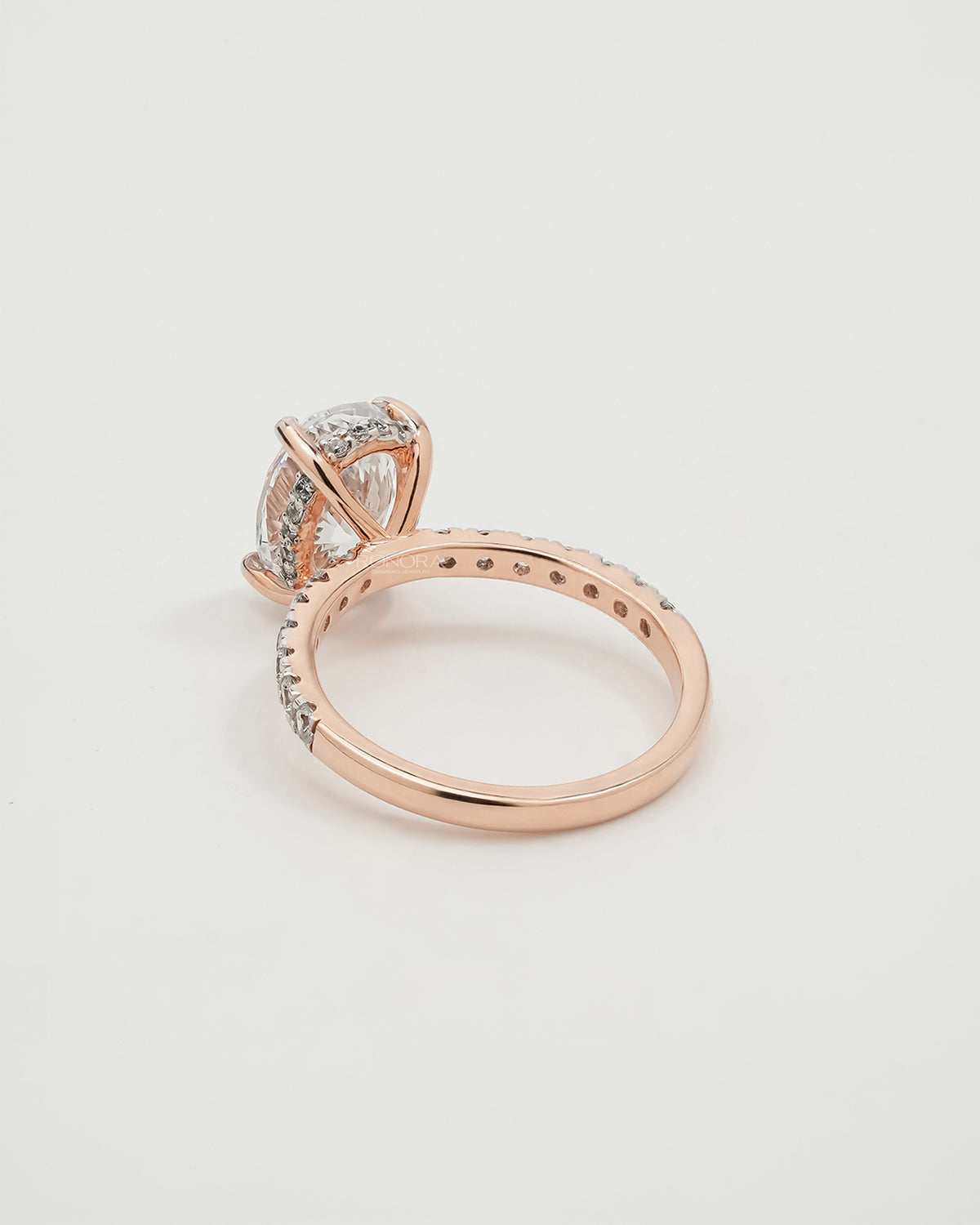 Back view of oval moissanite pave ring showing band detail