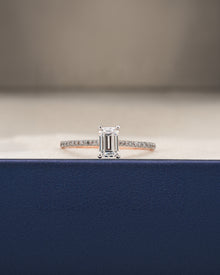 Elian emerald cut moissanite pave ring in rose gold inside Ronora box