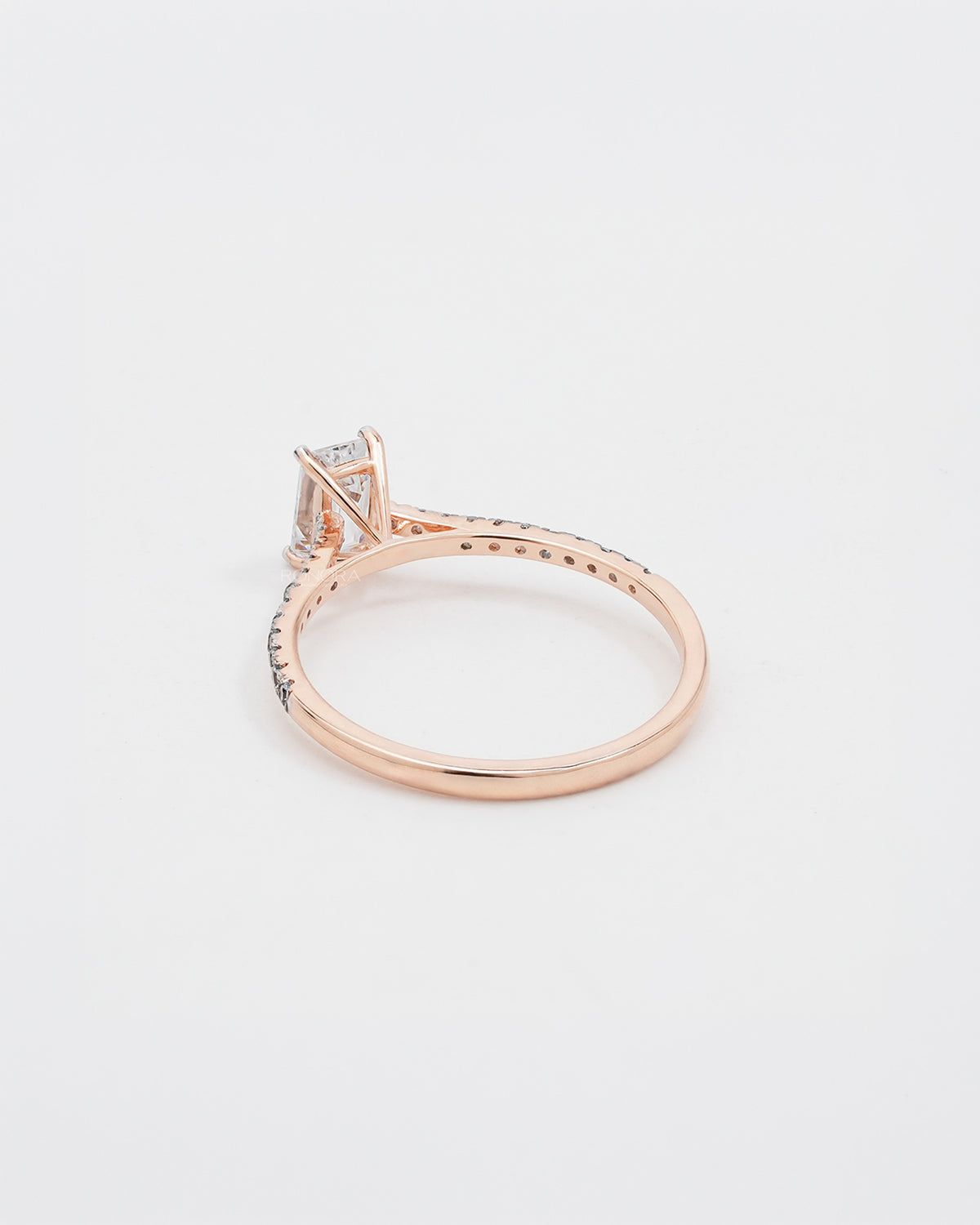 Back view of emerald cut moissanite pave ring showing band detail