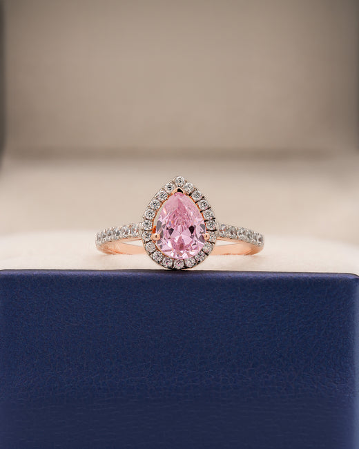 Livia pink pear moissanite halo ring in rose gold inside Ronora box