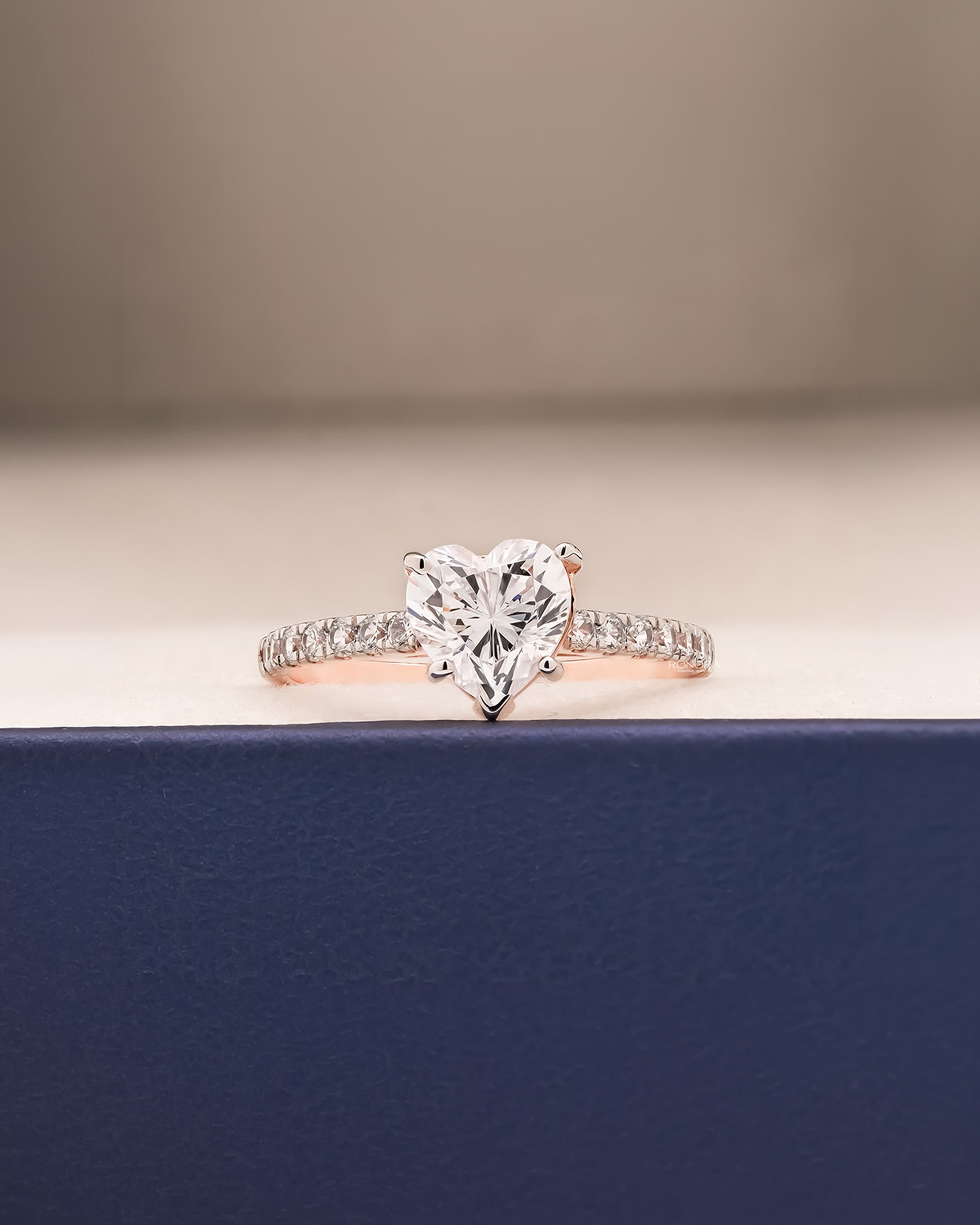 Amelie heart moissanite pave ring in rose gold inside Ronora box
