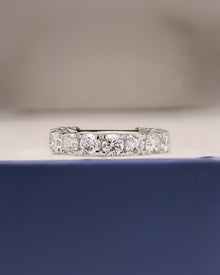 Evelina round lab grown diamond eternity band in white gold inside Ronora box