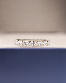Margaux oval lab grown diamond eternity band in white gold inside Ronora box