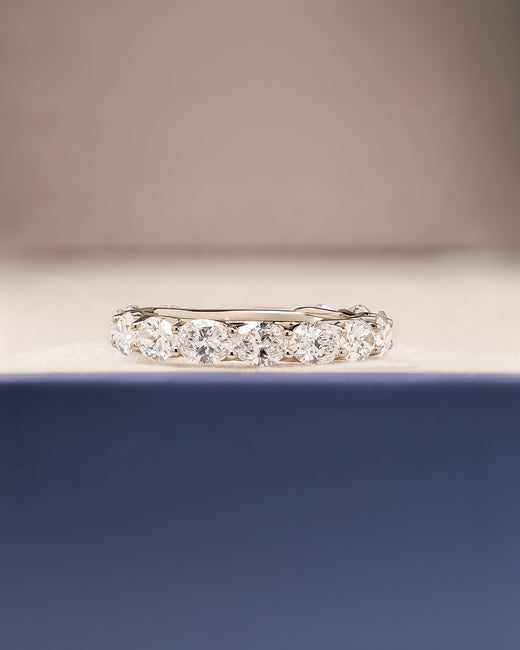 Margaux oval lab grown diamond eternity band in white gold inside Ronora box