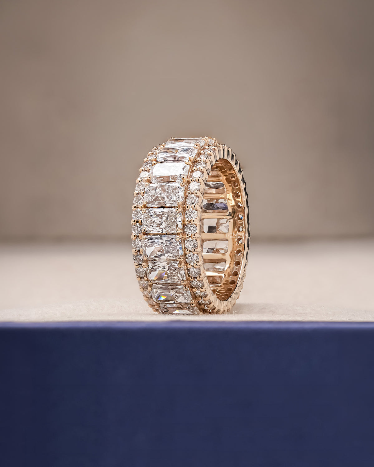 Angled view of radiant lab grown diamond eternity band with eternity setting
