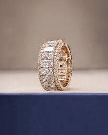 Angled view of radiant lab grown diamond eternity band with eternity setting