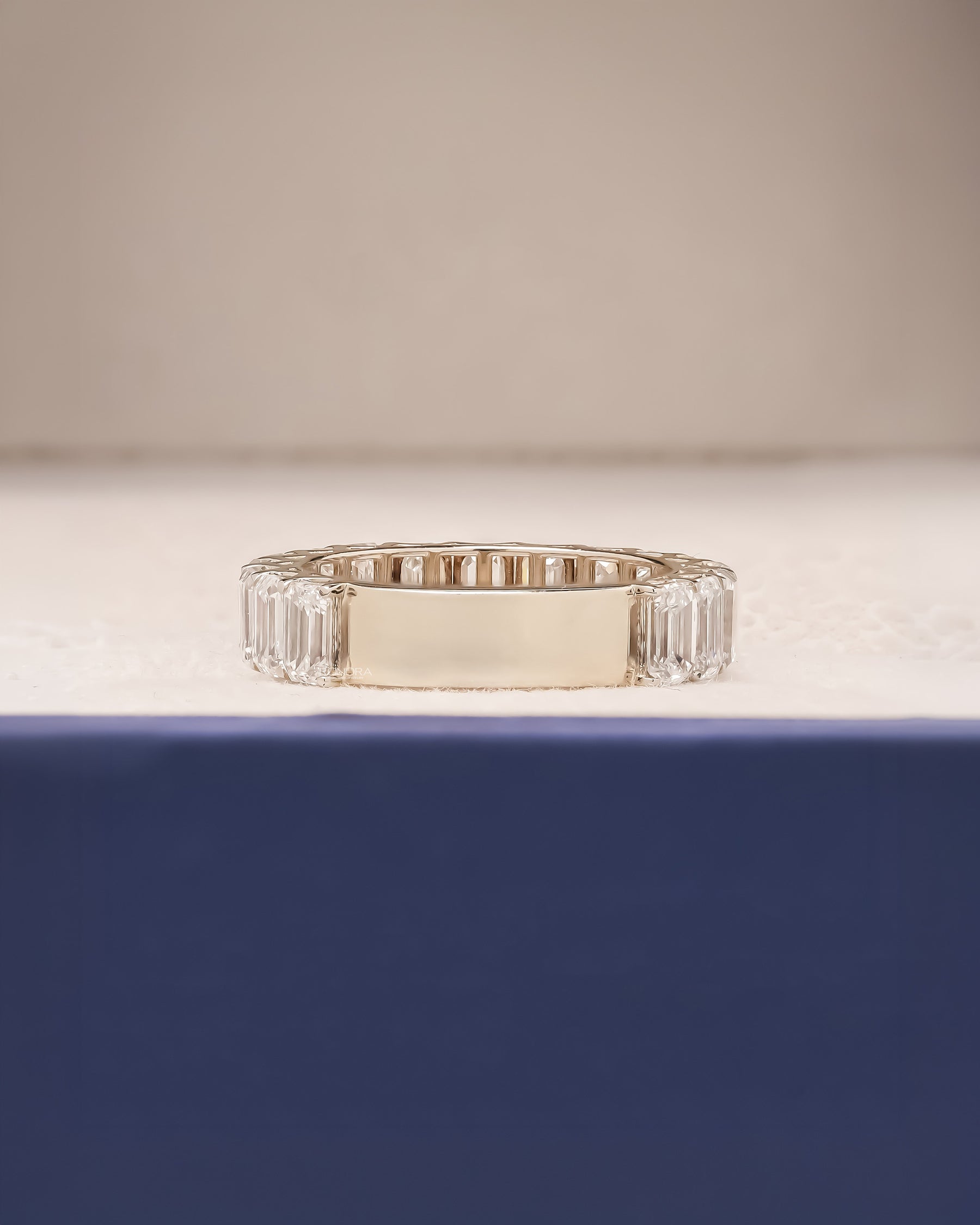 Back view of emerald lab grown diamond eternity band showing band detail