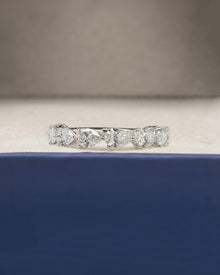 Sylvie pear lab grown diamond eternity band in white gold inside Ronora box