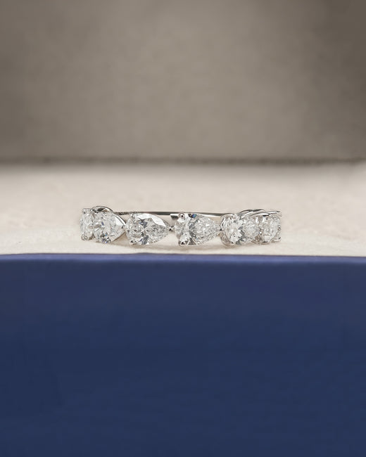 Sylvie pear lab grown diamond eternity band in white gold inside Ronora box