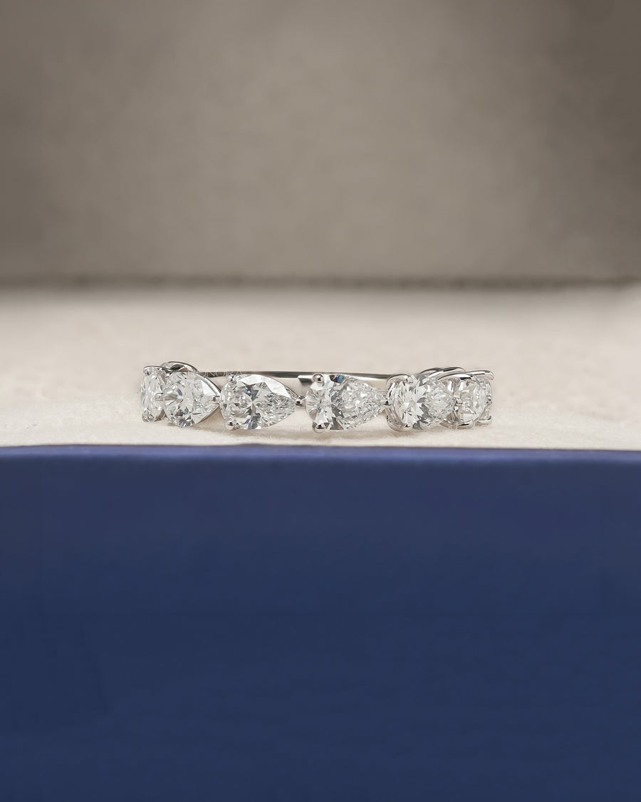 Sylvie pear lab grown diamond eternity band in white gold inside Ronora box