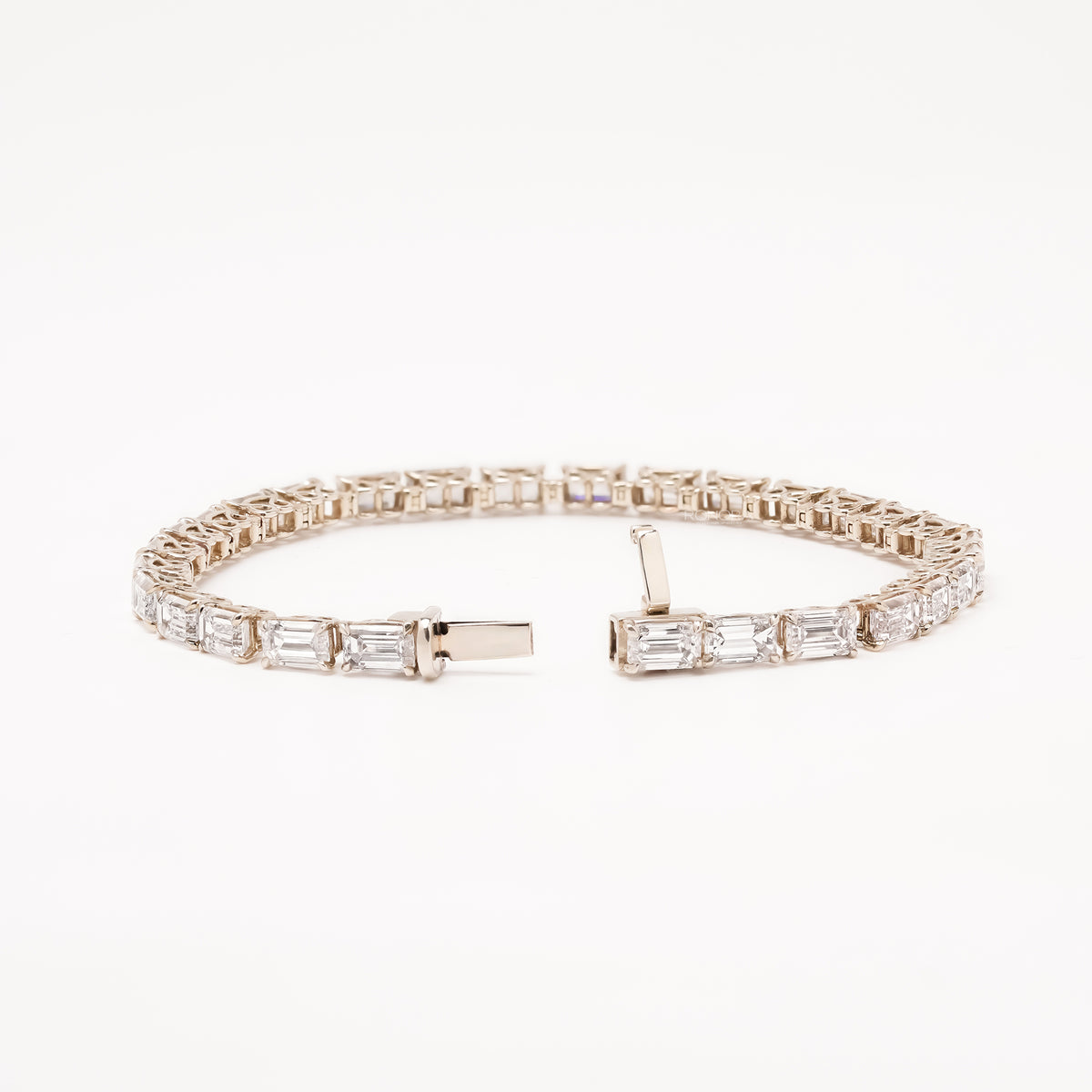 Open emerald lab grown diamond tennis bracelet with clasp
