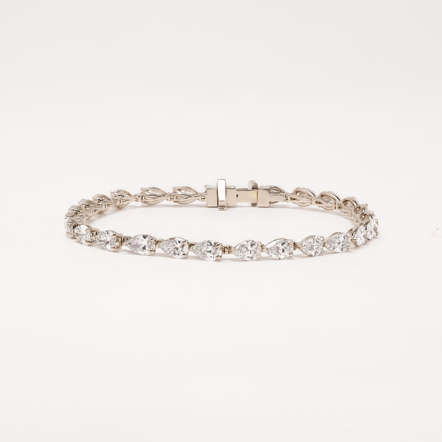 Caliane pear lab grown diamond tennis bracelet on white background
