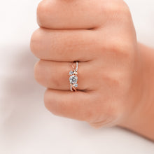 round lab grown diamond bypass ring worn on hand in rose gold