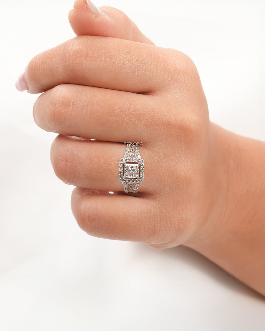 princess lab grown diamond halo ring worn on hand in rose gold