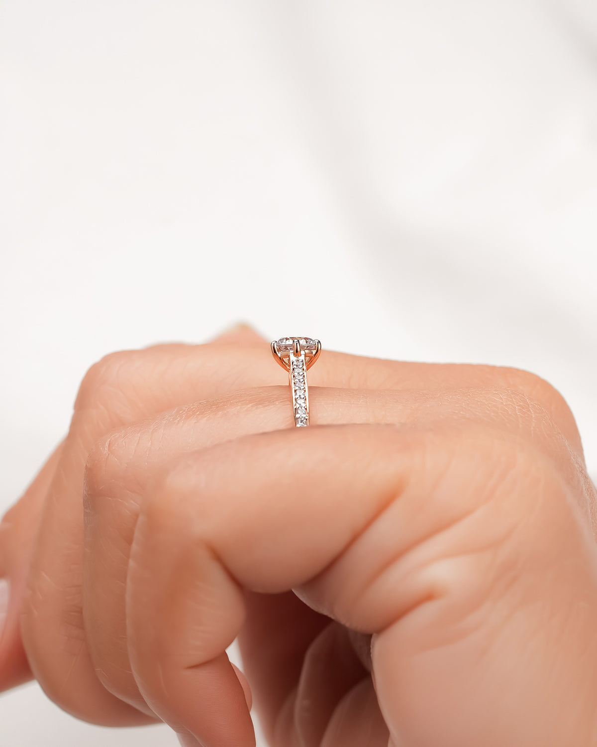 Back view of round moissanite pave ring showing band detail