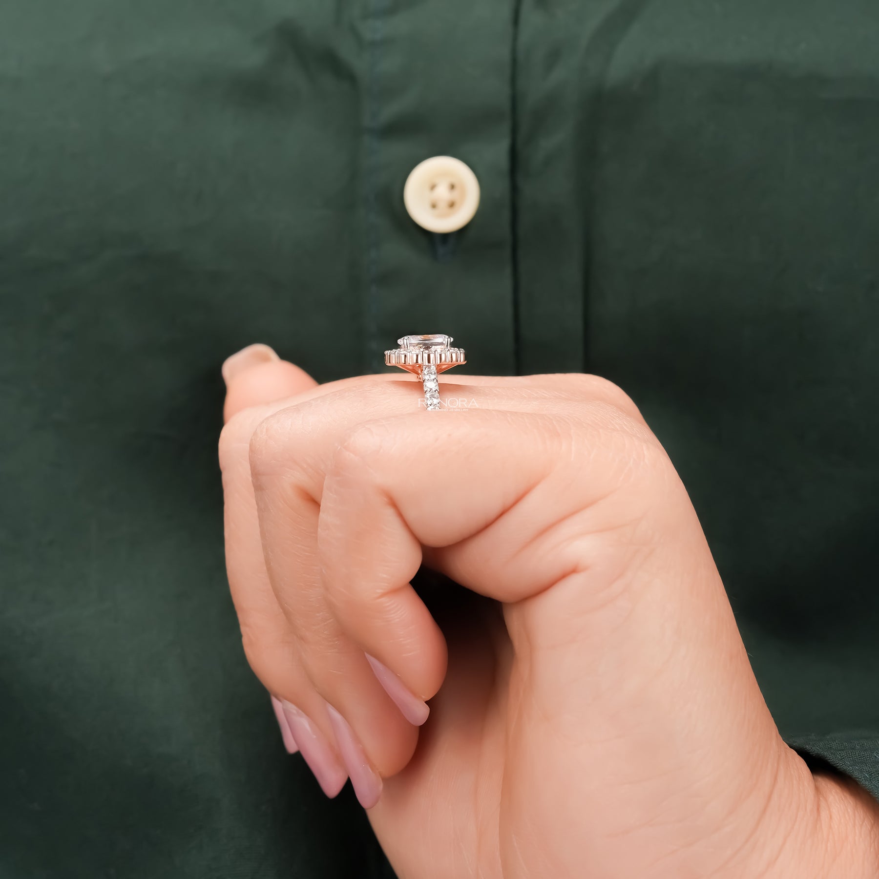 Side profile of oval moissanite halo ring showing ring setting