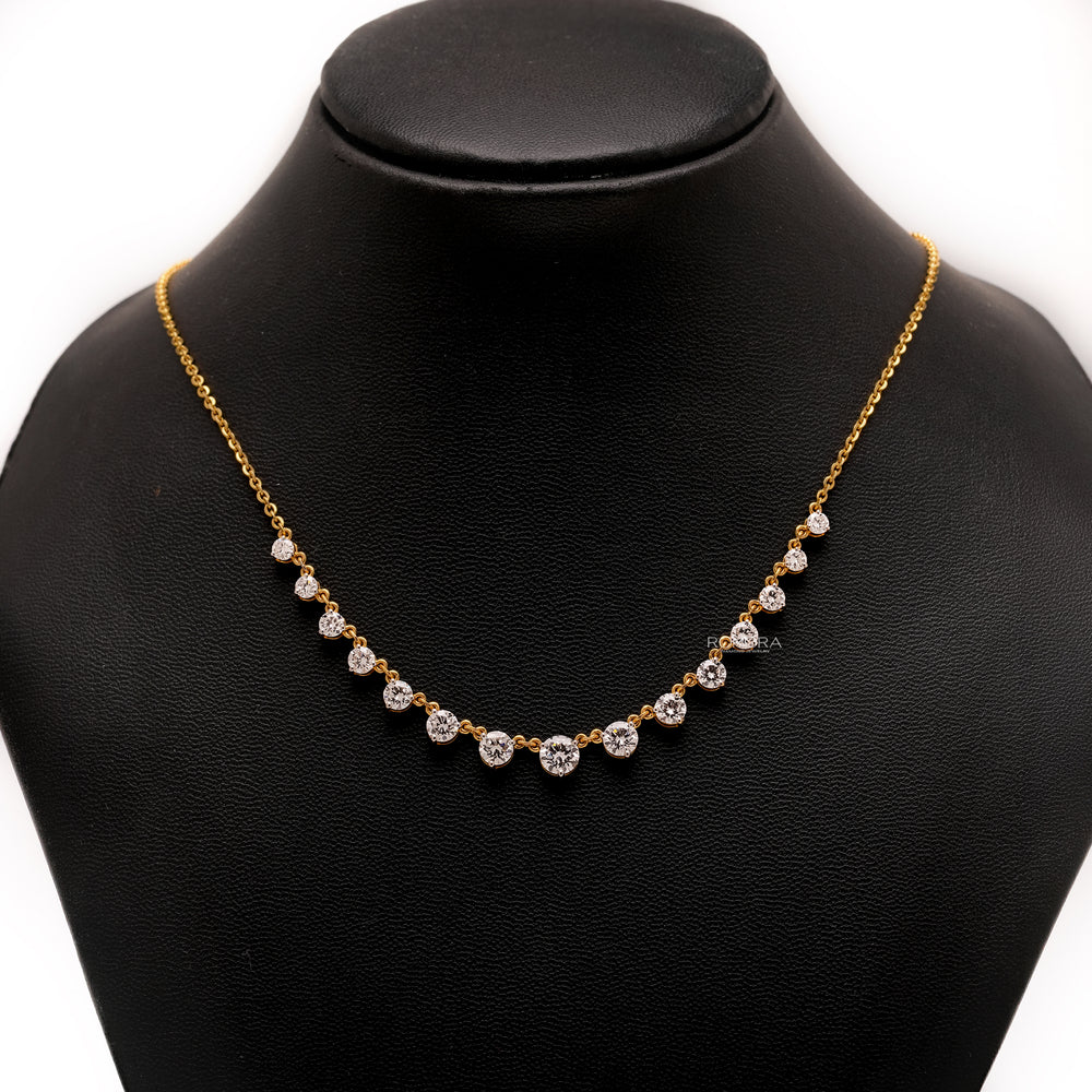 Round lab grown diamond tennis necklace in yellow gold on a black display bust, front view