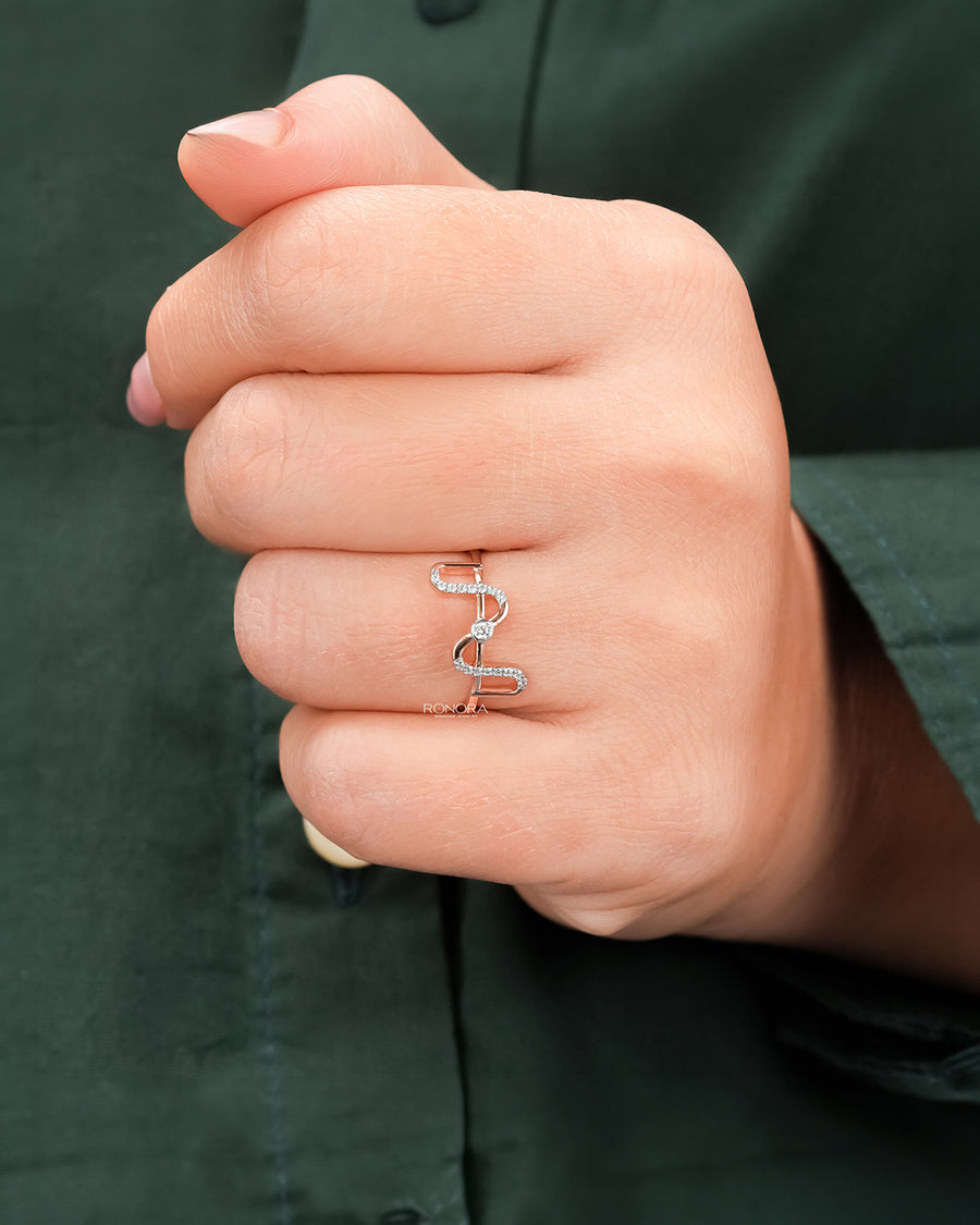 Open lab grown diamond geometric ring worn on hand in rose gold