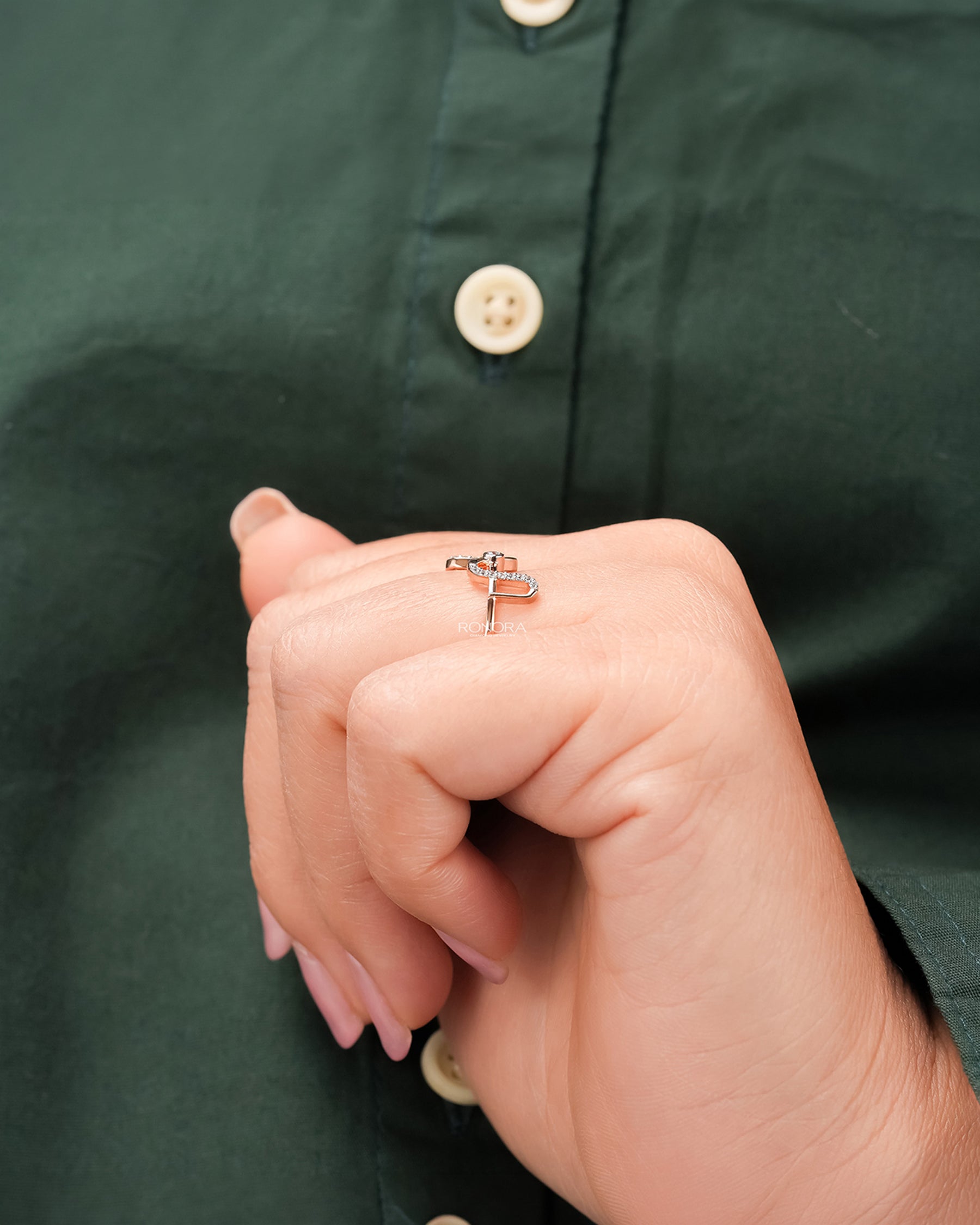 Open lab grown diamond geometric ring worn with white silk