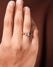 Close-up detail of emerald lab grown diamond signet ring in yellow gold