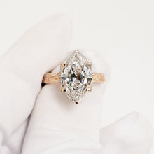 Violette marquise lab grown diamond vintage halo ring in yellow gold inside Ronora box