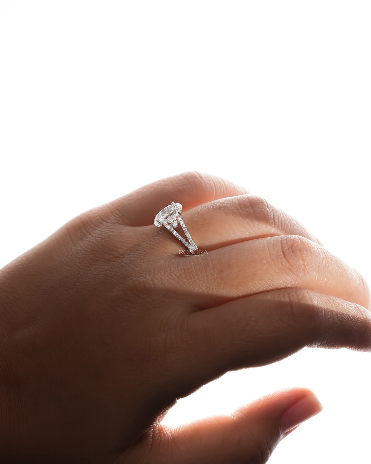 Back view of oval lab grown diamond halo ring showing band detail