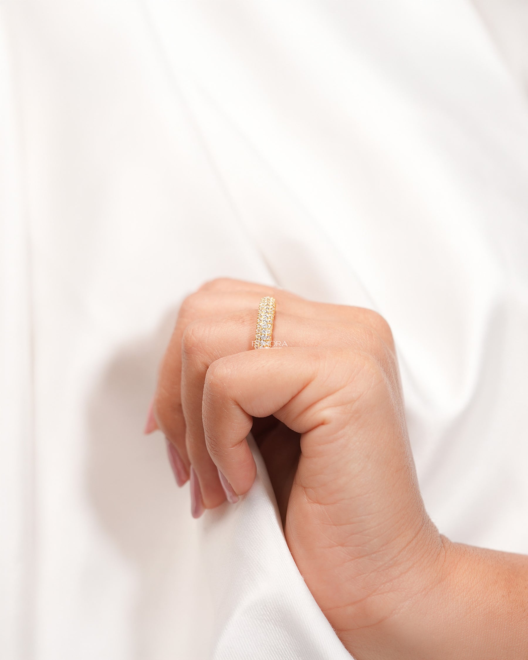 Wide lab grown diamond pavé band worn with white silk