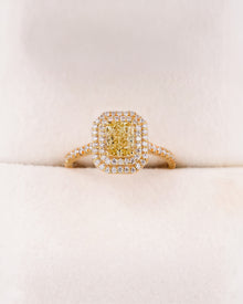 Elodie yellow radiant lab grown diamond halo ring in yellow gold inside Ronora box