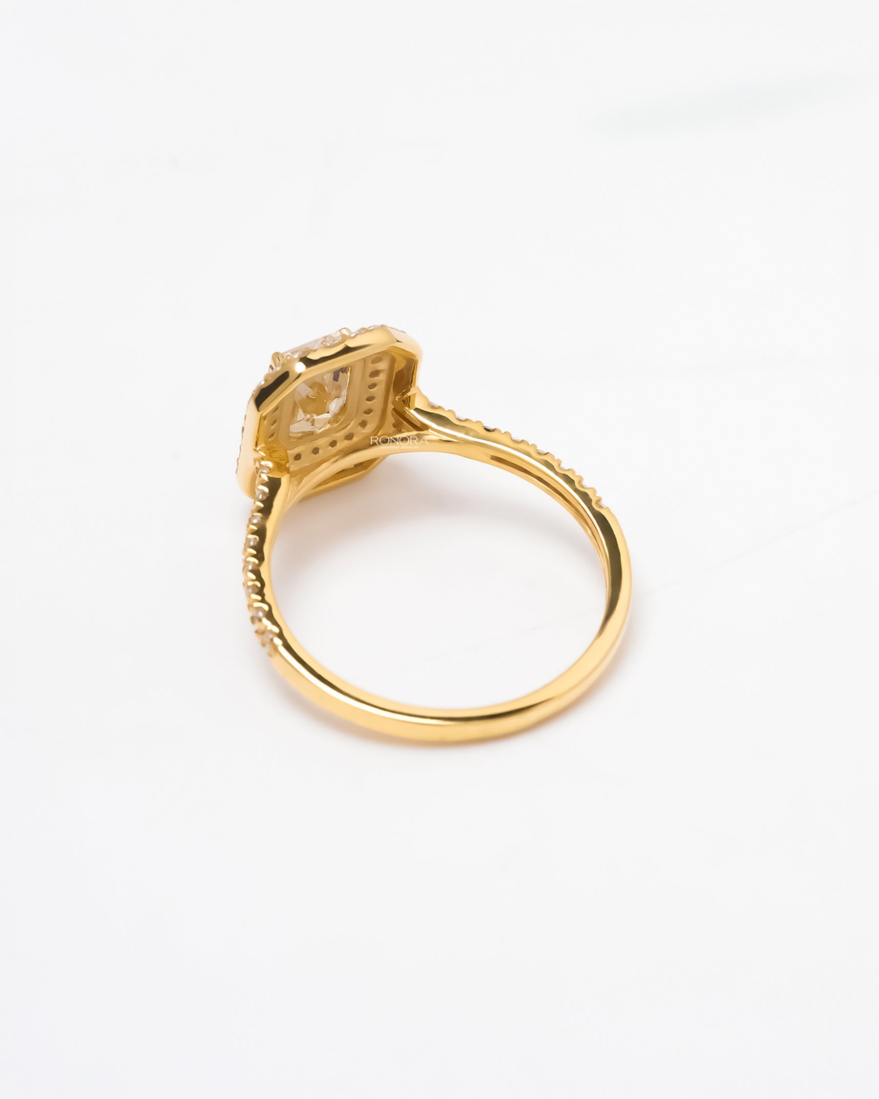 Back view of yellow radiant lab grown diamond halo ring showing band and gallery detail