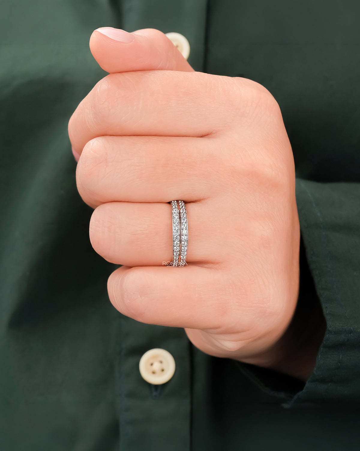 Double-row lab grown diamond pavé band worn on hand in rose gold