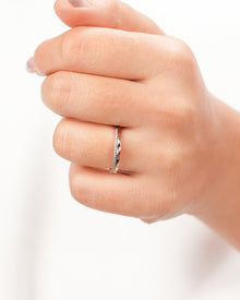 Split lab grown diamond pavé band worn on hand in rose gold