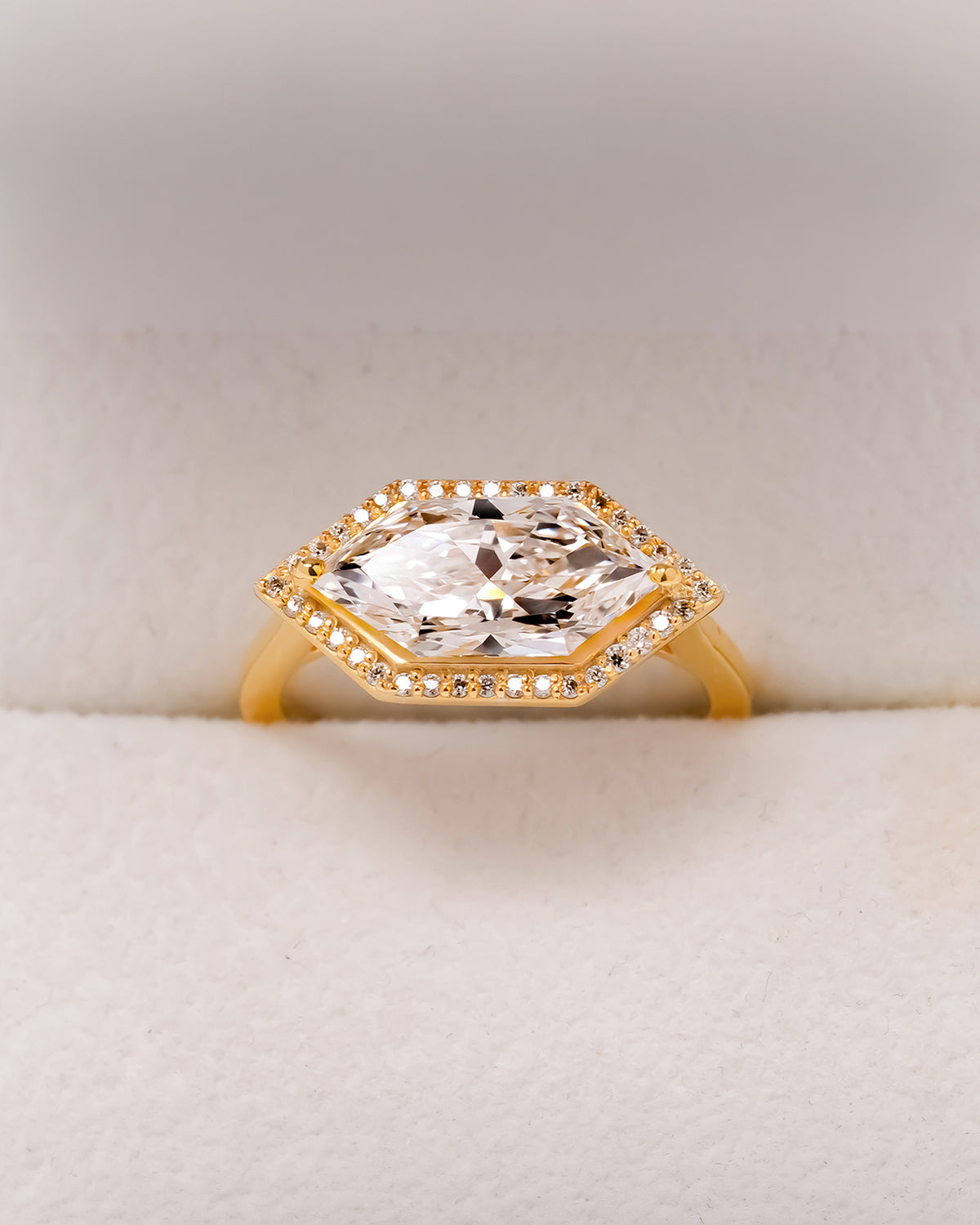 Marcelline marquise lab grown diamond halo ring in yellow gold front view