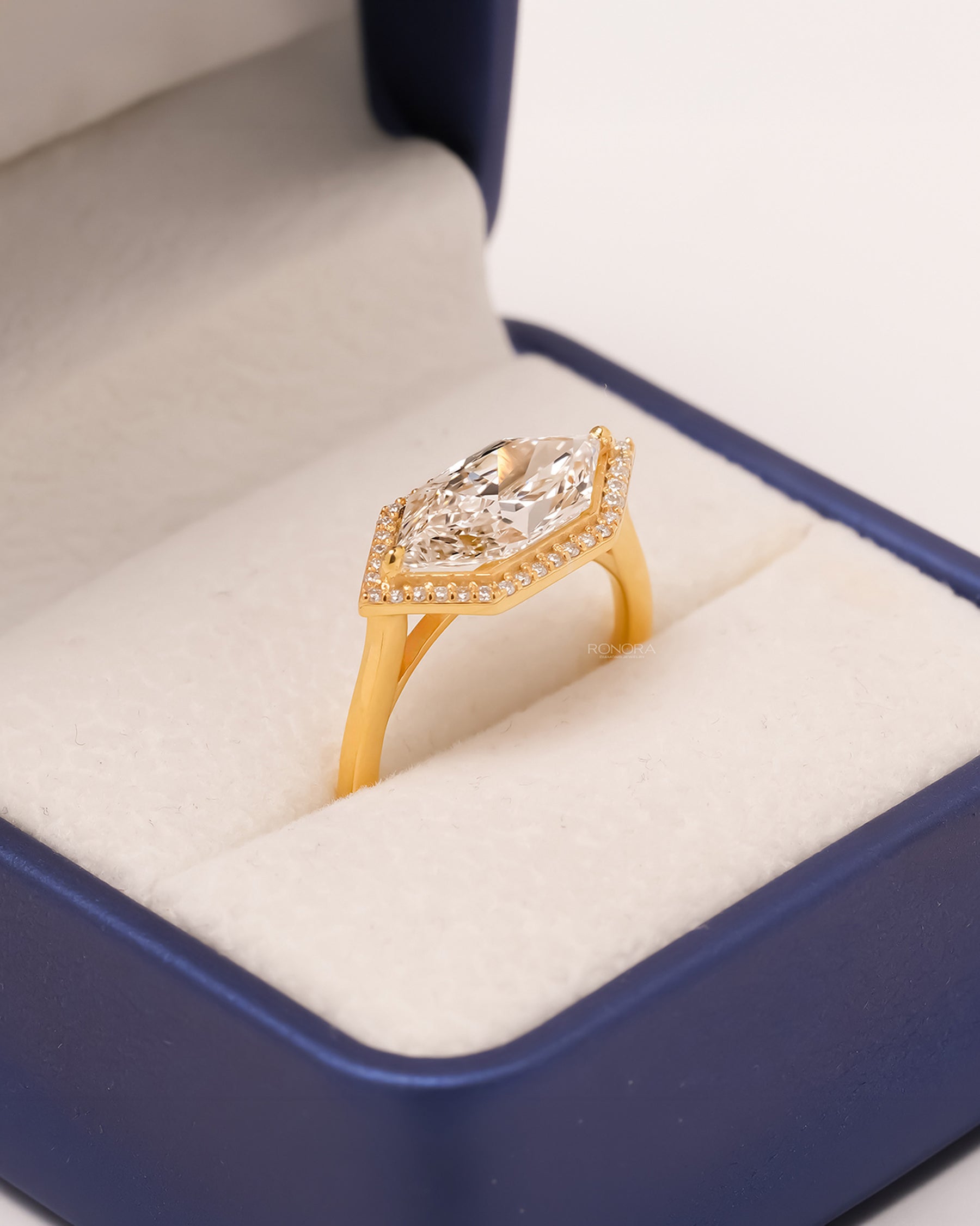 Yellow gold marquise lab grown diamond halo ring in Ronora box