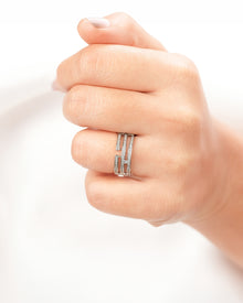 Wide lab grown diamond pavé band worn on hand in white metal