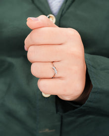 marquise lab grown diamond curved ring worn on hand in rose gold
