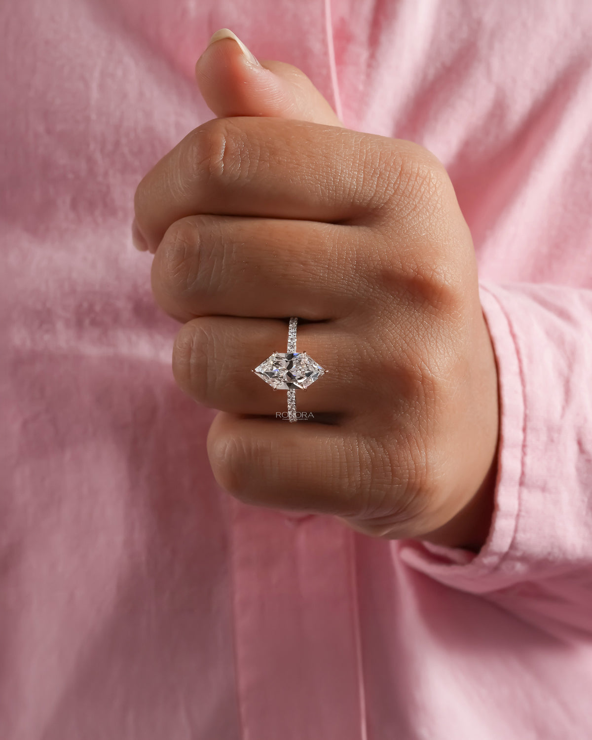 marquise lab grown diamond solitaire ring worn on hand in white gold
