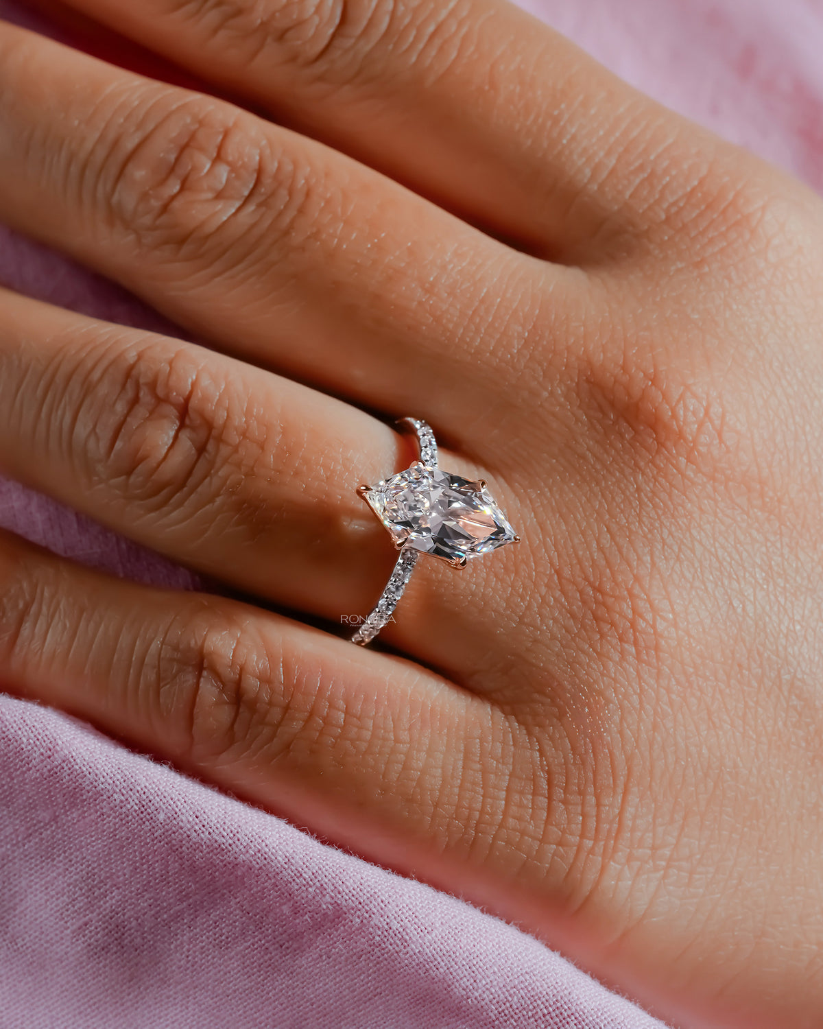 Detail view of marquise lab grown diamond solitaire ring in white gold