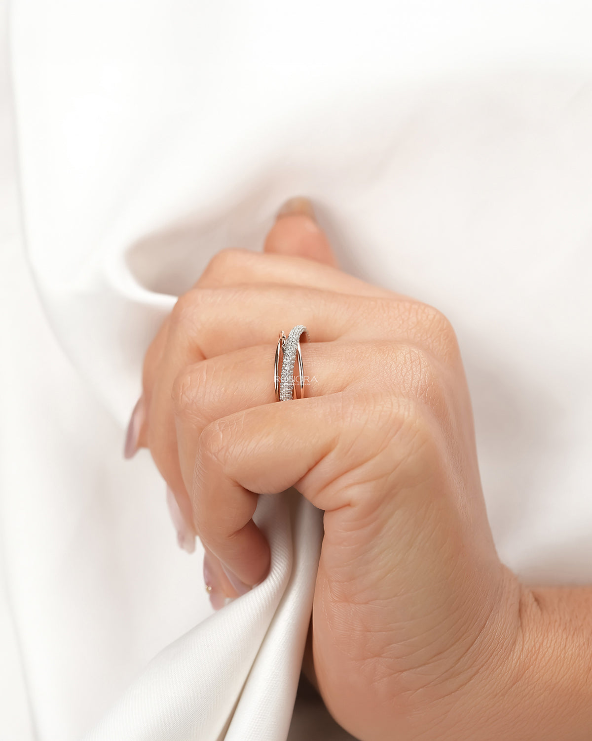 Multi-row lab grown diamond pavé band worn with white silk