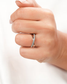 Double-row lab grown diamond pavé band worn on hand in rose gold