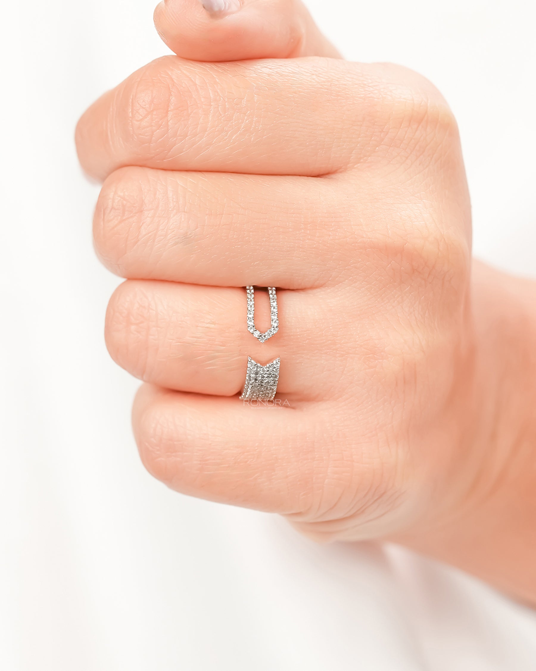 Open lab grown diamond pavé statement ring worn on hand in rose gold
