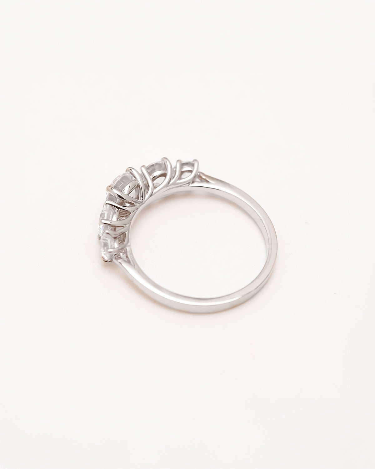 Back view of five-stone lab grown diamond ring showing gallery and shank